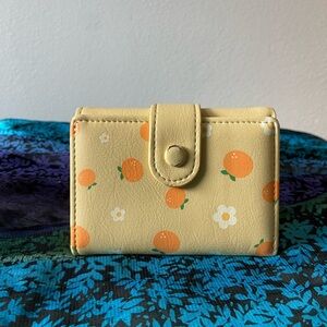 Yellow Tri-Fold Wallet with Orange Print